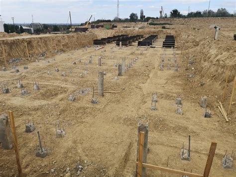 geopile construction|Piloți presați prin imersie statică și proiectare fundații .